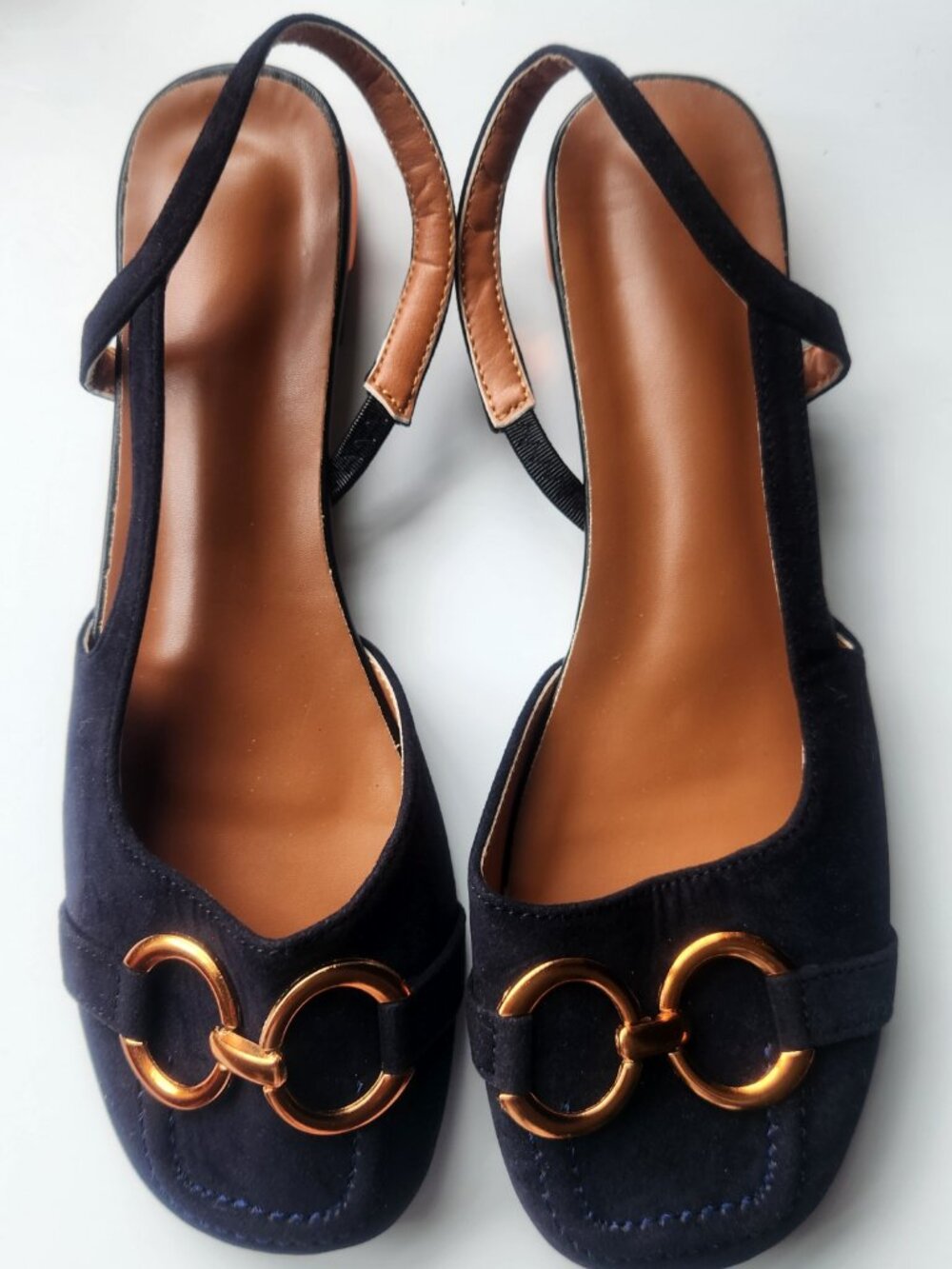 Flat heeled sling back shoes